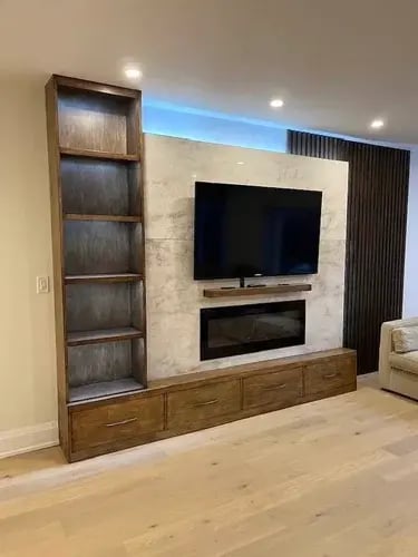 living room hardwood floor and tv cabinet installation from floor heaven located in Hamilton and Stoney Creek Ontario